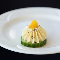 Cucumbers, hummus, orange segments and sumac - Cold bites