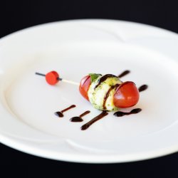 Cherry tomato, bocconcini and basil skewers with balsamic vinegar reduction - Cold bites