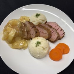 Pork tenderloin stuffed with prosciutto and cheese in wine sauce - Hot meal